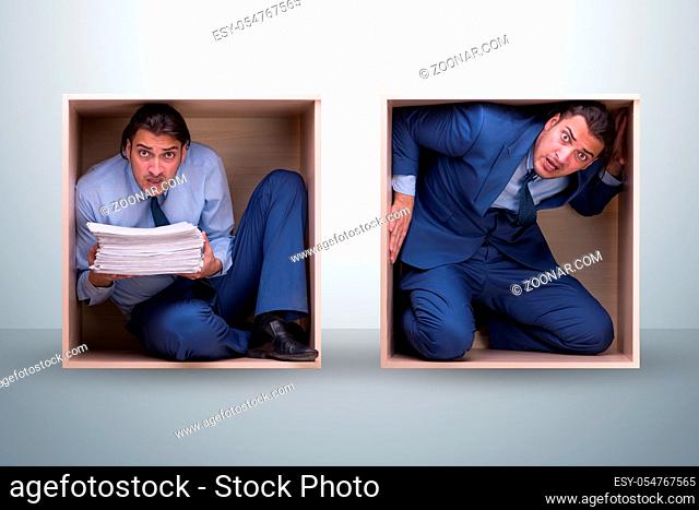 The employee working in tight space
