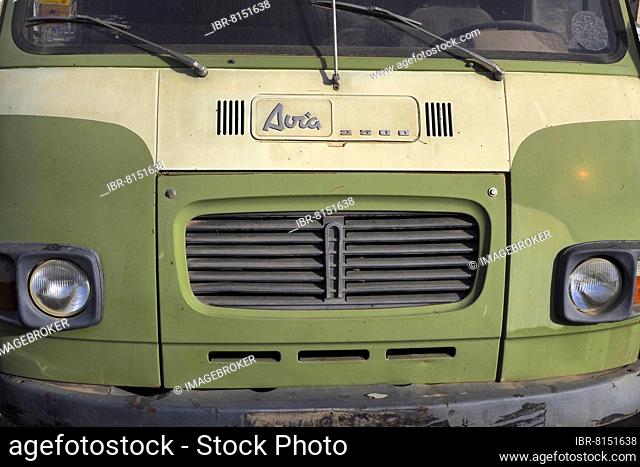Front view of lime green Avia van, radiator grille, scrap car, scrap yard, metal recycling, scrap metal reuse, metal recycling, sustainability