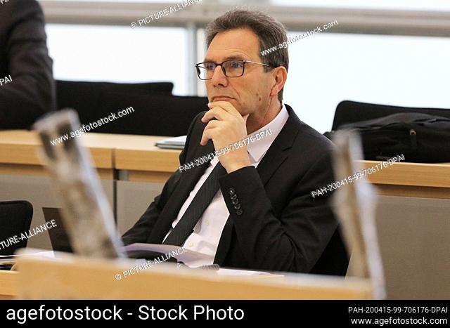 15 April 2020, Saxony-Anhalt, Magdeburg: Rüdiger Malter, State Secretary in the Ministry of Finance, sits in the plenary hall of the Landtag during the public...