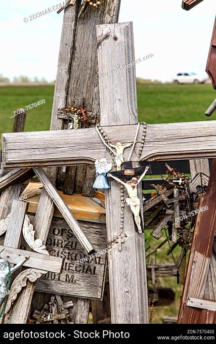 SIAULIAI, LITHUANIA - MAY 1, 2015 : Close up detailed front view of hill of crosses with over four hundred thousand crosses and crucifix