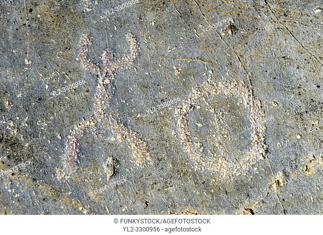 Petroglyph, rock carving, of what is known as a praying man carved by the Camunni people in the iron age between 1000-1600 BC, Rock no 1