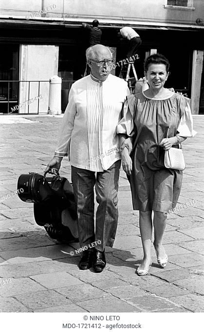 Slava Rostropovich walking with Galina Pavlovna Vishnevskaya. Soviet-born American cellist and conductor Slava Rostropovich (Mstislav Rostropovich) walking...