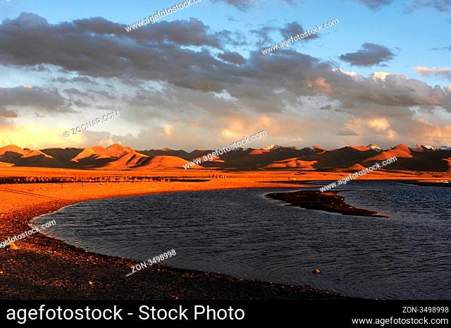 Landscape at lakeside in the highlands of Tibet at sunset