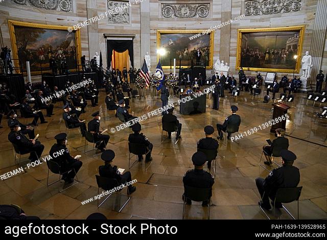 WASHINGTON, DC - FEBRUARY 3: .U.S. Capitol Police Officers and other guests are seated around the remains during a ceremony memorializing U.S