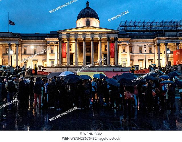 Belgians and Londoners gather at a vigil in Trafalgar Square to show Britain's solidarity with the families and pay tribute to the victims of the recent...