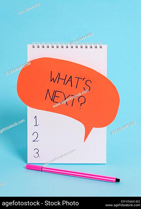 Handwriting text writing What S Next Question. Conceptual photo Get information Ask Query Investigate Probes Explore Standing blank spiral notepad speech bubble...