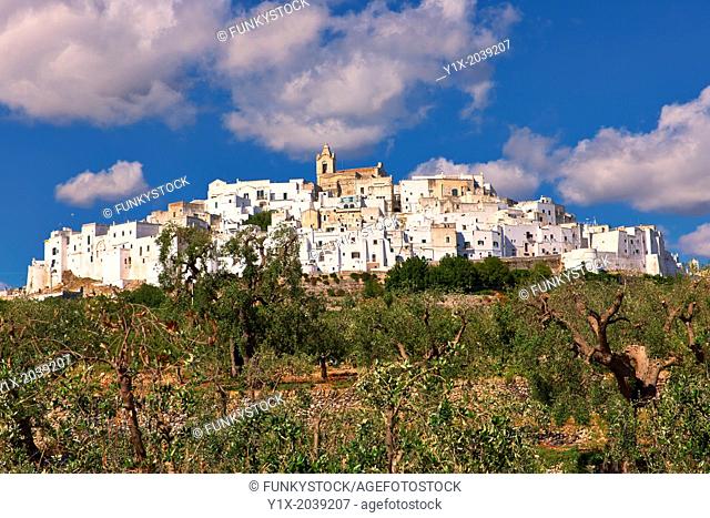 The medieval white fortified hill town walls of Ostuni, The White Town, Puglia, Italy