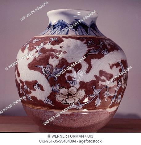 A pot with an underglaze painting of Taoist symbols, the dragon and the peony