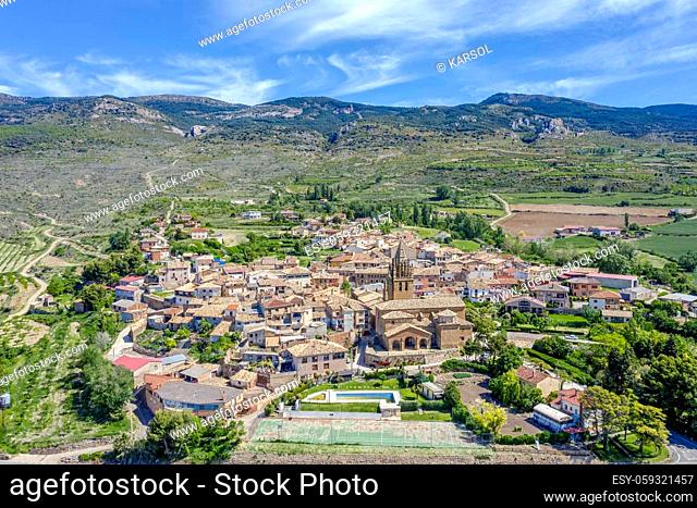 Panoramic views of the town of Loarre Aragon Huesca Spain, foreground the Church of San Esteban, old houses, narrow streets, in the background the Castle