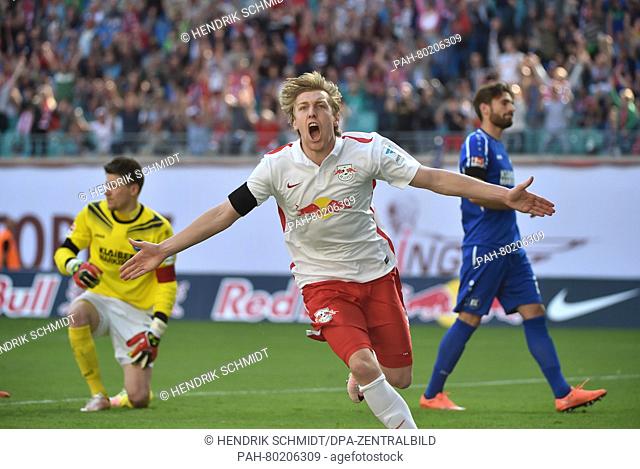 Leipzig's Emil Forsberg (C) celebrates the 1-0 goal, with Karlruhe's goalkeeper Rene Vollath pictured to his left, during the German second division Bundesliga...