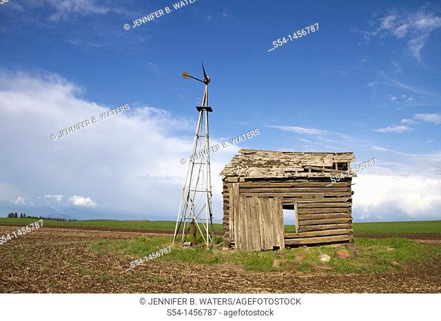 An old well house and windmill near Spangle, Washington, USA