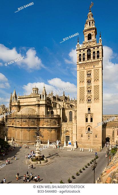 Seville Spain La Giralda tower and cathedral seen across Plaza Virgen de los Reyes
