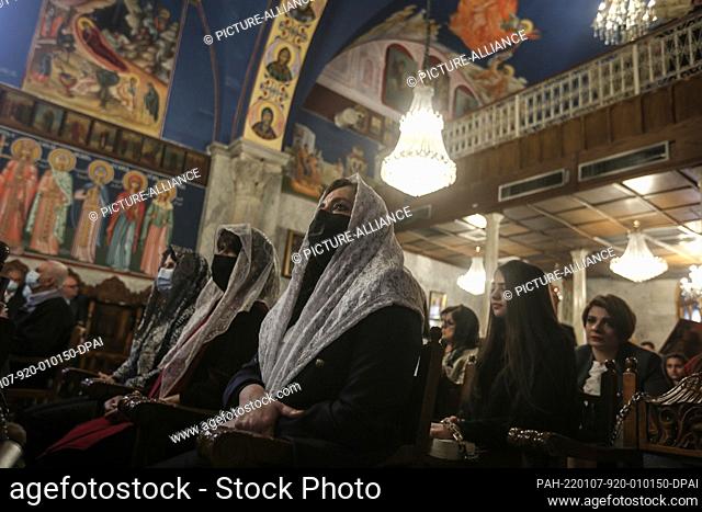 07 January 2022, Palestinian Territories, Gaza City: Palestinian Greek Orthodox Christians attend the Christmas Eve Mass