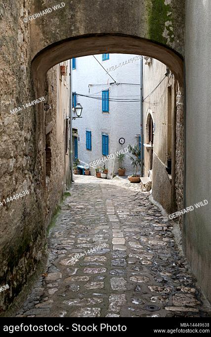 Narrow alley and passageway in the old town, City of Krk, Island of Krk, Kvarner Bay, County of Primorje-Gorski kotar, Croatia, Europe