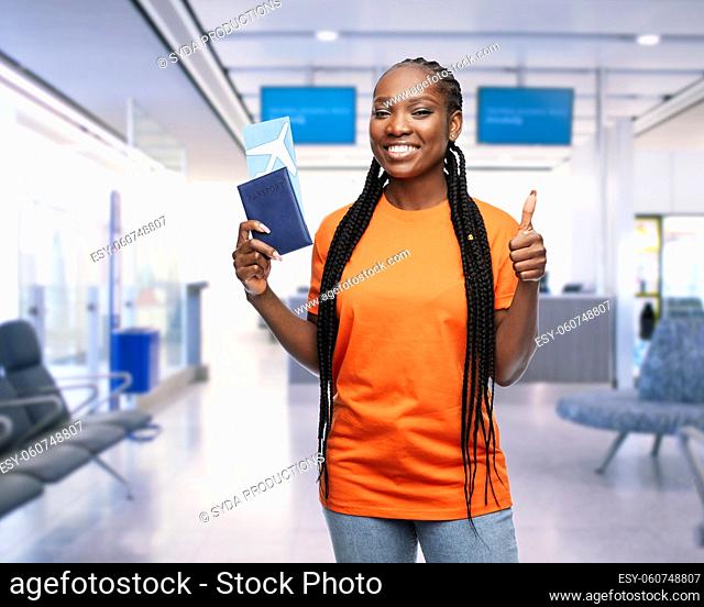 woman with passport and air ticket at airport