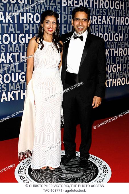 MOUNTAIN VIEW, CA - NOV 8: Umaima Marvi (L) and founder of Kahn Academy Salman Khan attend the Breakthrough Prize Ceremony at NASA AMES Research Center on...