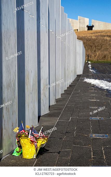 Shanksville, Pennsylvania - A basket with flowers and flags at the Wall of Names at the Flight 93 National Memorial. The memorial remembers those killed on...