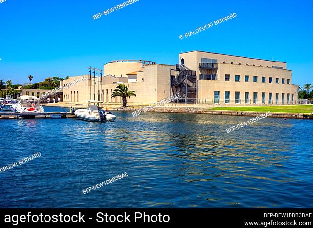 Olbia, Sardinia / Italy - 2019/07/21: Panoramic view of the Archeological Museum of Olbia - Museo Archeologico - on Gulf of Olbia island at the port area