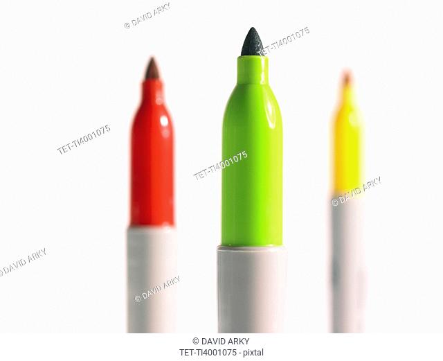 Studio shot red, green and yellow felt-tip pen