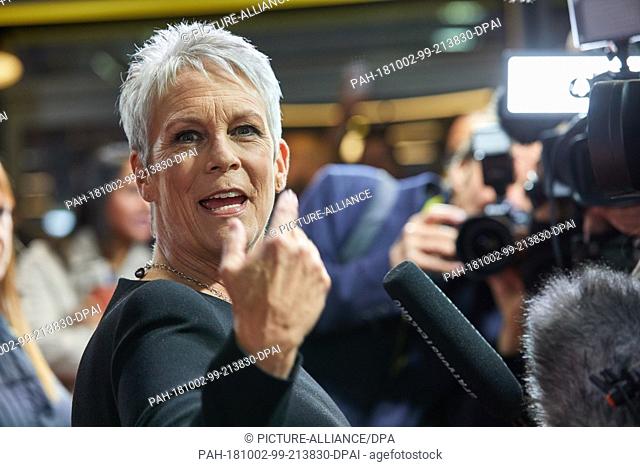 02 October 2018, Hamburg: Jamie Lee Curtis, actress and producer from the USA, gives interviews before the premiere of ""Halloween"" on the red carpet at the...