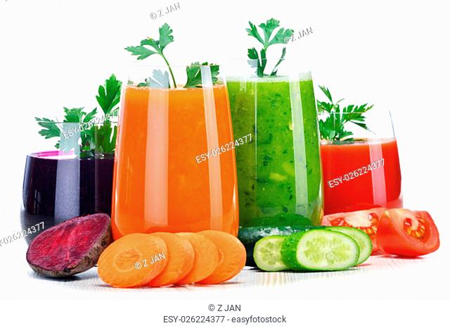 Glasses with fresh vegetable juices isolated on white. Detox diet