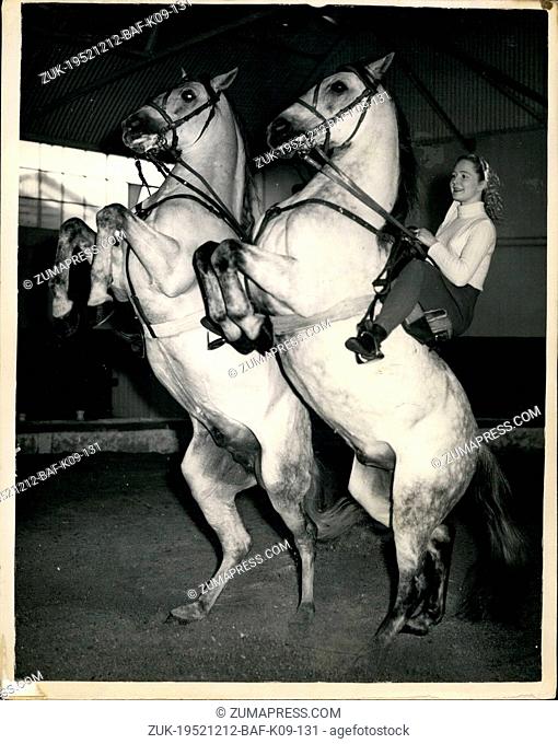 Dec. 12, 1952 - Rehearsing For The Christmas Circus At Ascot, Unique Spanish Horse Act: Photo Shows Miss Joan Fowles of Liverpool on right on 'Decadeido' and...