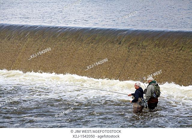 Grand Rapids, Michigan - Fishermen below a dam on the Grand River in downtown Grand Rapids