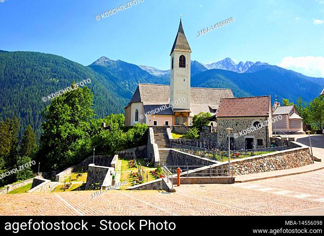 Village church of Sankt Walburg with cemetery in the South Tyrolean Ulten Valley