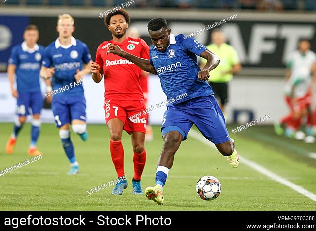 Omonia's Bruno and Gent's Michael Ngadeu fight for the ball during the match between Cypriot soccer club Omonia Nicosia and Belgian team KAA Gent