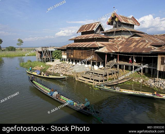 Tourists arrive by boat to monastery in Inle lake, Shan state, Myanmar