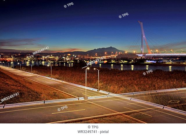 Light trail of the road at the night; Beitou Refuse Incineration Plant;Bike Path; Taipei; Taiwan