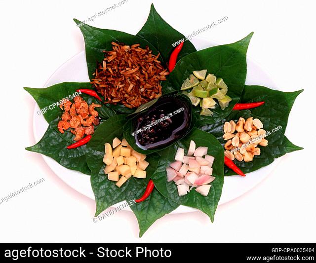 <i>Miang kham</i> is a snack food that originated in the northern part of Thailand, originally using pickled tea leaves (called <i>miang</i> in the northern...