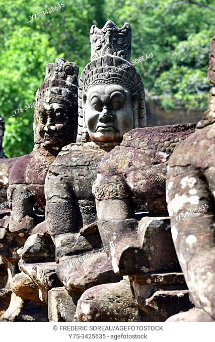 South Gate statues in Angkor archaelogical area in Siem Reap, Cambodia, South Esat Asia