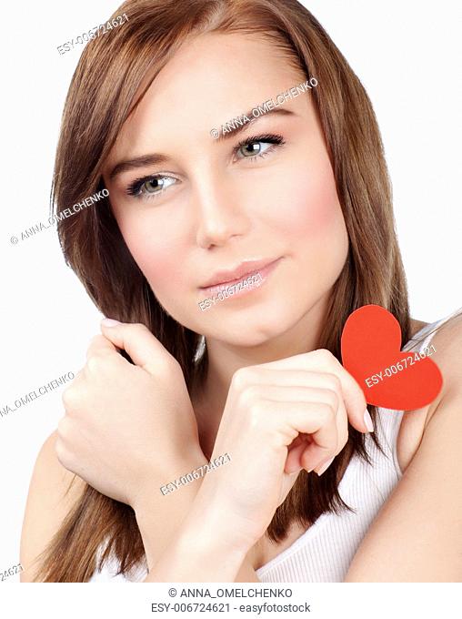 Image of serious female holding in hand red heart-shaped greeting card, symbol of love, romantic message, Valentine day, isolated on white background