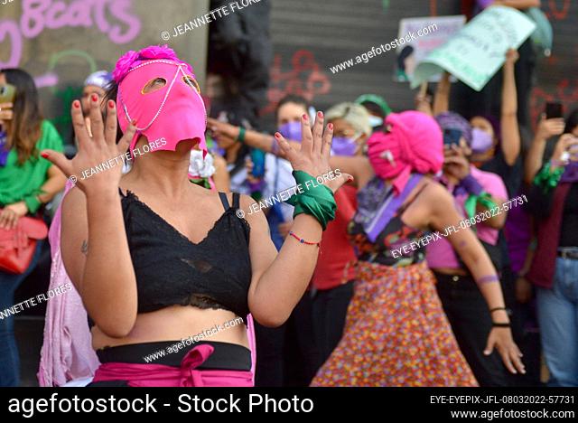 MEXICO CITY, MEXICO - MARCH 8, 2022: Women take part during a performance while join demonstration from the Angel of Independence to the Mexico City downtown to...