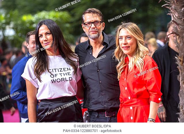 Bettina Zimmermann (l-r), Kai Wiesinger and Marisa Leonie Bach attend the German premiere of 'Once Upon A Time in ... Hollywood' at Sony Center in Berlin