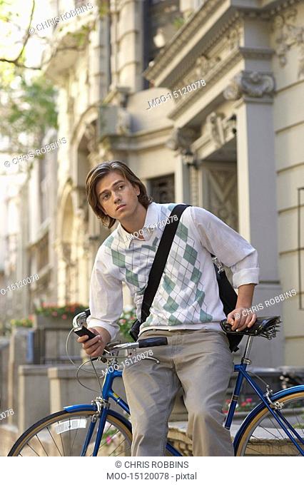 Man sitting on bicycle