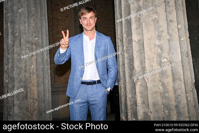 09 June 2021, Berlin: Albrecht Schuch arrives at the opening night of the 71st International Film Festival at the open-air cinema Museumsinsel for the screening...