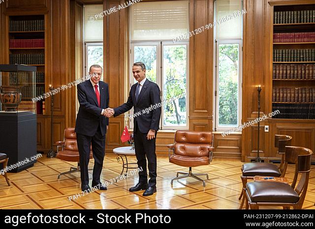 07 December 2023, Greece, Athen: Turkish President Recep Tayyip Erdogan meets Greek Prime Minister Kyriakos Mitsotakis during his official visit to Athens