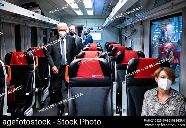 25 August 2021, Berlin: Federal President Frank-Walter Steinmeier walks into a train (EC 379), on the way from Berlin to Prague (Czech Republic) to his seat...
