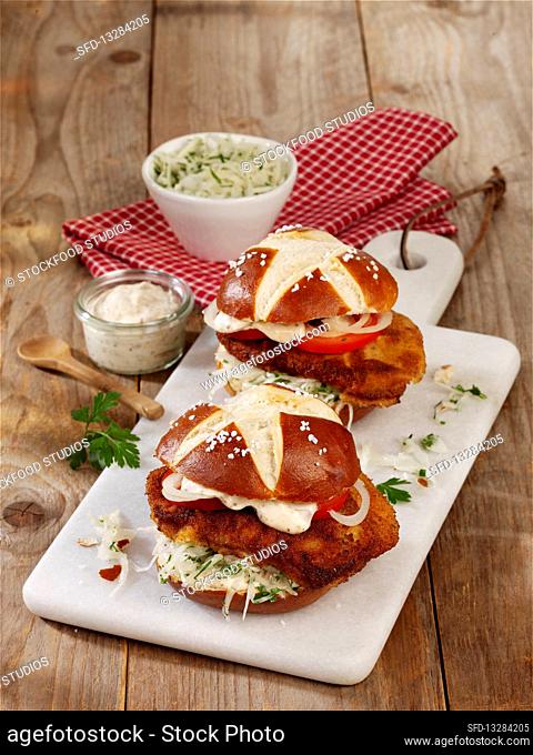 Escalope sandwiches in lye bread rolls with a white cabbage slaw