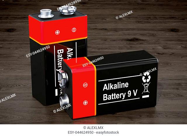9V batteries on the wooden background, 3D rendering
