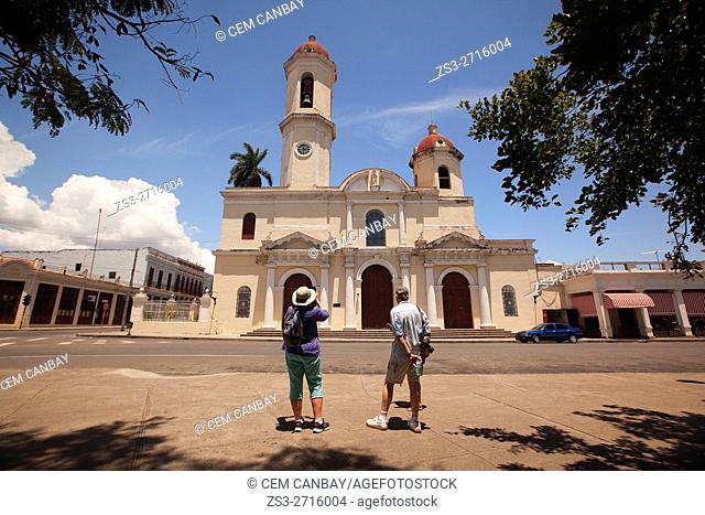 Tourists in front of the Purisima Concepcion Cathedral in Jose Marti Park, Cienfuegos, Cuba, West Indies, Central America