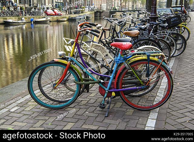 Canal and parked bicycles, Amsterdam, North Holland, Netherlands