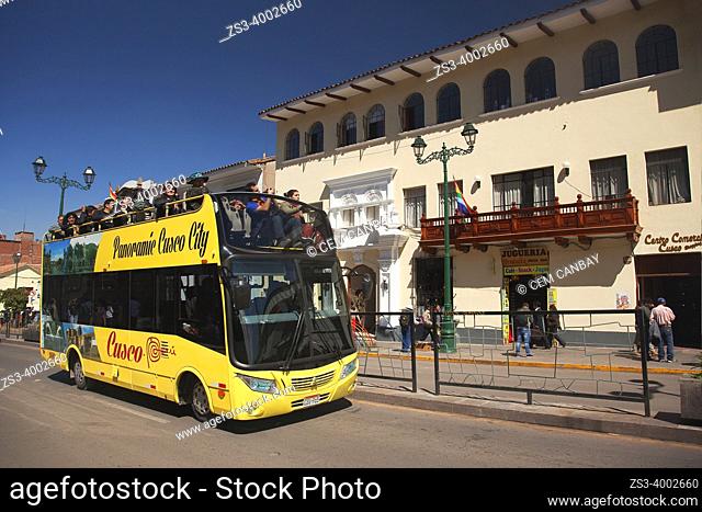 Tourists on the city tour bus at Avenida El Sol in the historic center, Cusco Province, Incas Sacred Valley, Peru, South America