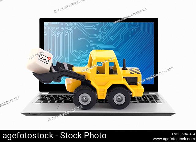 Bulldozer with new email graphic on computer key on laptop isolated over white background