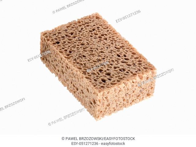 Close-up of cleaning sponge on white background. Big porous sponge isolated on white background