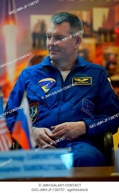 Expedition 39 backup crew member Alexander Samokutyaev of the Russian Federal Space Agency (Roscosmos) is seen in quarantine, behind glass