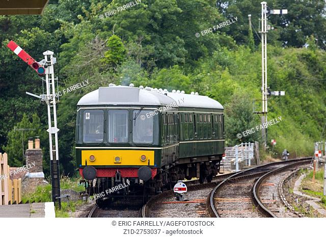 diesel unit , Class 121 British Rail vintage locomotive , running on the preserved swanage railway line at Corfe station
