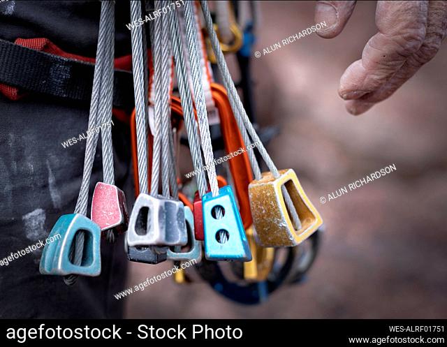 Close up of different rock climbing equipment
